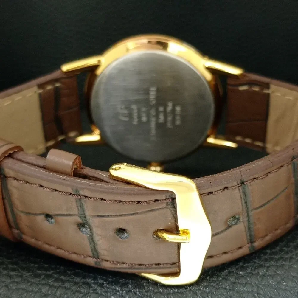 Vintage 1987 HMT Manual Wound Mens Gold Watch & Red accents
